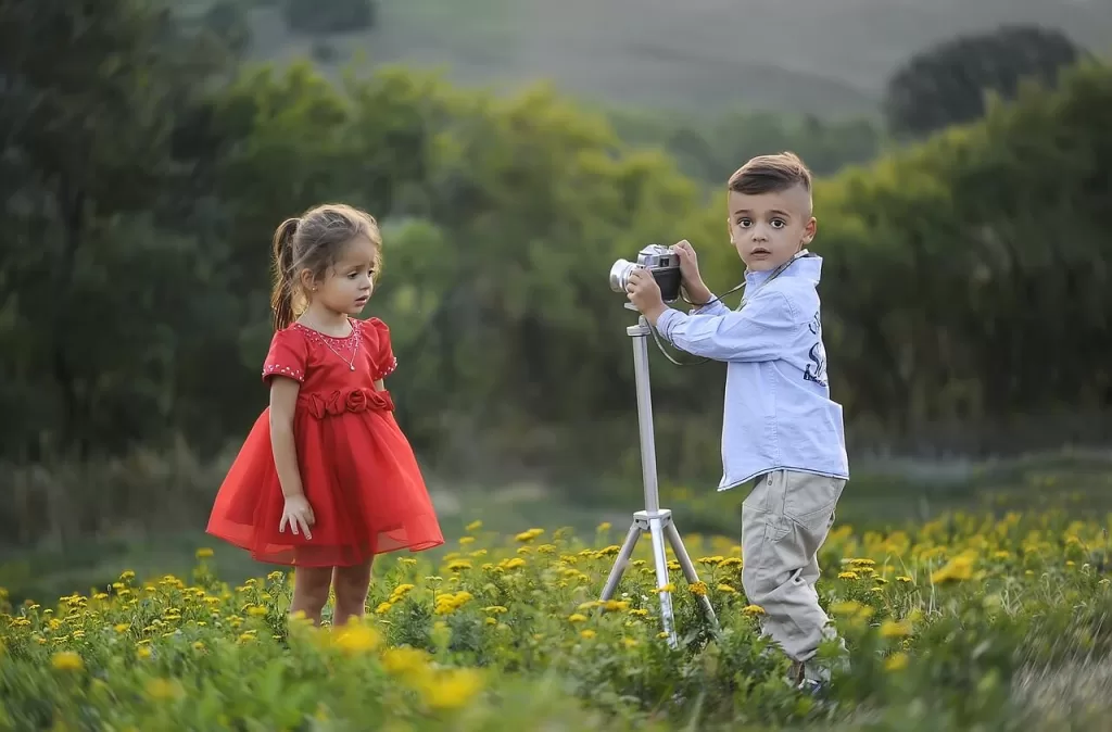 Children taking photograph with their skills