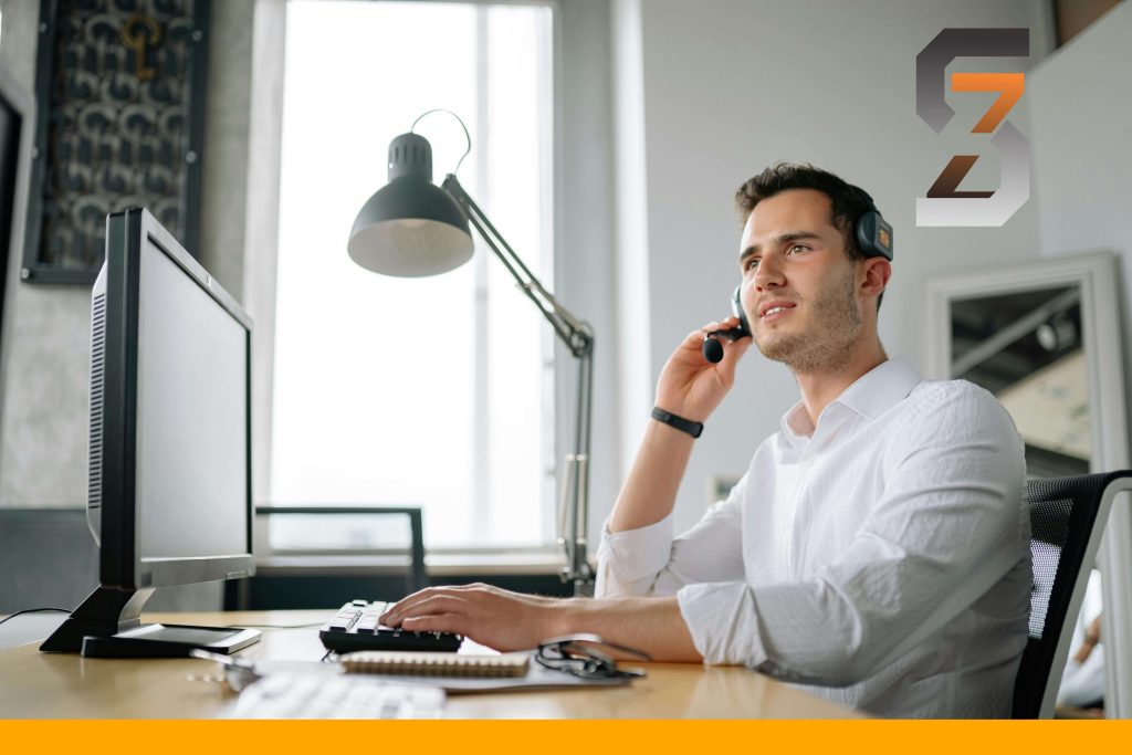 Man talking with client during the duration of his writing job